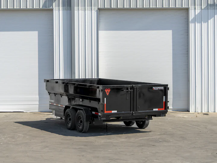 Texas Pride 16'x83" Bumper Pull Dump Trailer w/ 36" Sides, rear three-quarter view