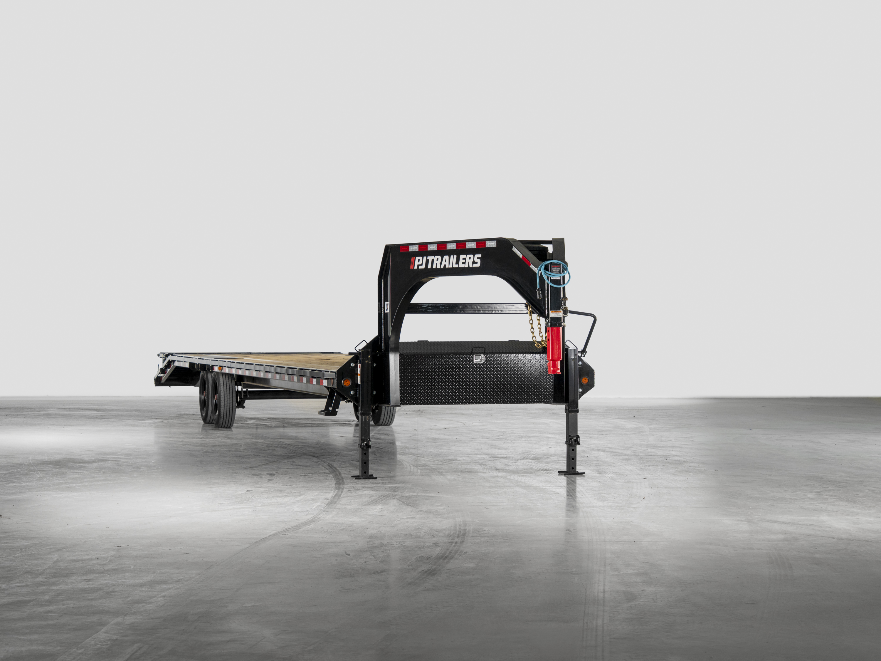 PJ Trailers Low-Pro Flatdeck With 8K Singles, studio view 1