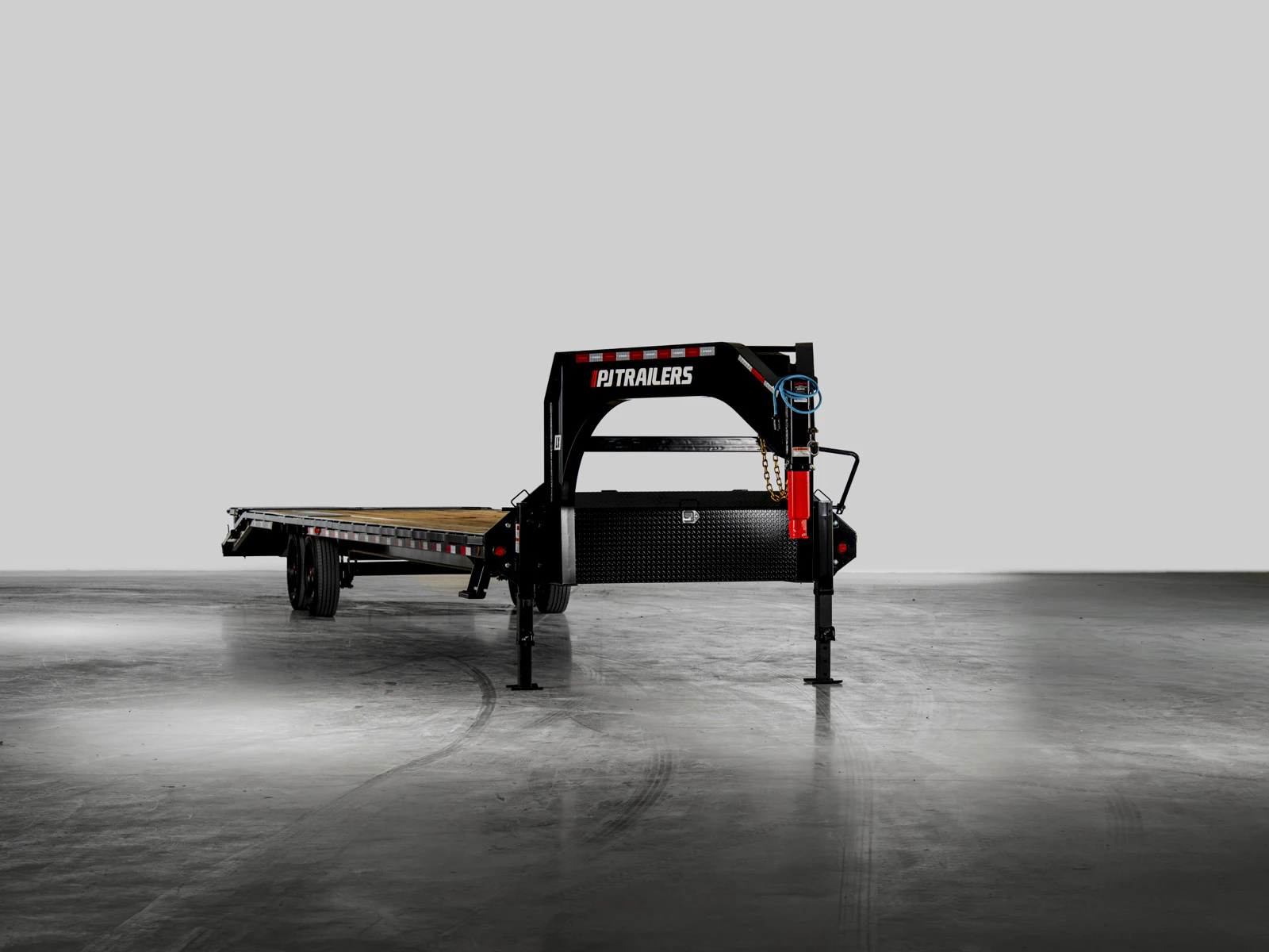 PJ Trailers Low-Pro Flatdeck With 8K Singles, studio view 1 PJ Trailers Low-Pro Flatdeck With 8K Singles, studio view 1