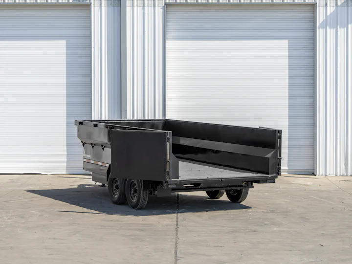 Texas Pride 16'x83" Bumper Pull Dump Trailer w/ 36" Sides, rear three-quarter doors open view