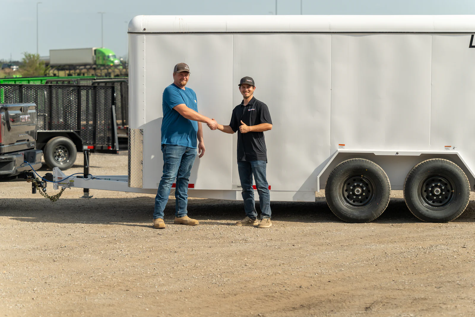 Customer closing the deal on a new enclosed trailer