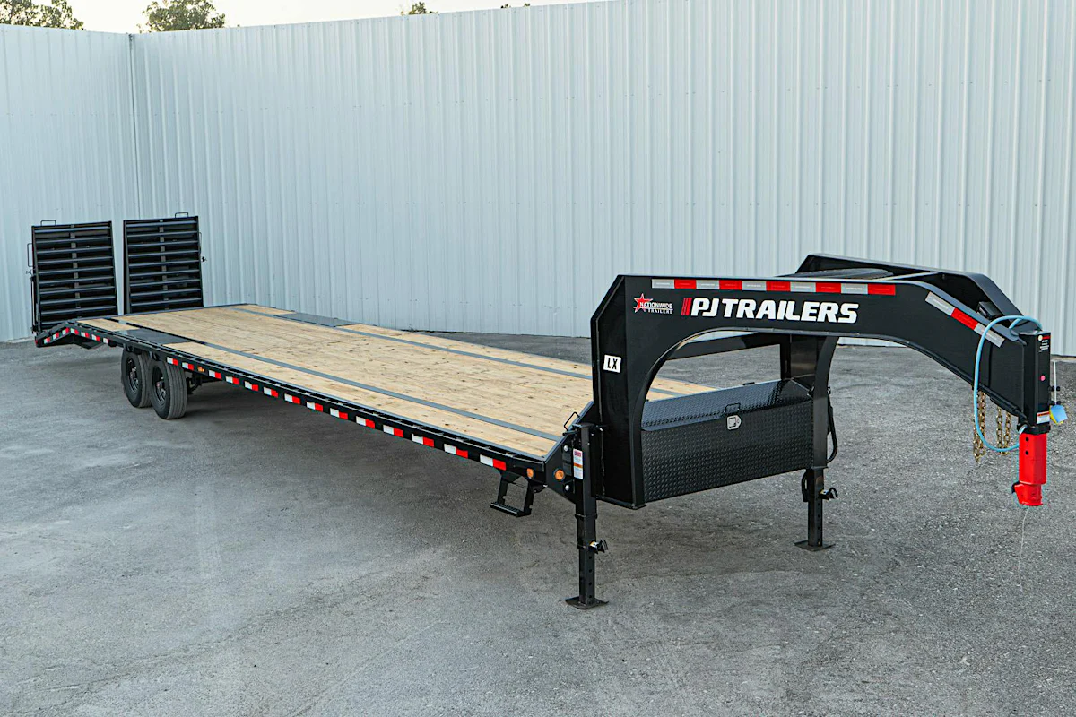 PJ Trailers 40'x102" 18k Gooseneck Flatbed Trailer w/ Singles (LX) - Stock #91286 - Image 1 of 14 PJ Trailers 40'x102" 18k Gooseneck Flatbed Trailer w/ Singles (LX) - Stock #91286 - Image 1 of 14