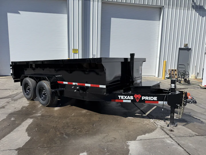 Texas Pride 14'x83" Bumper Pull Dump Trailer w/ 24" Sides, front passenger three-quarter view