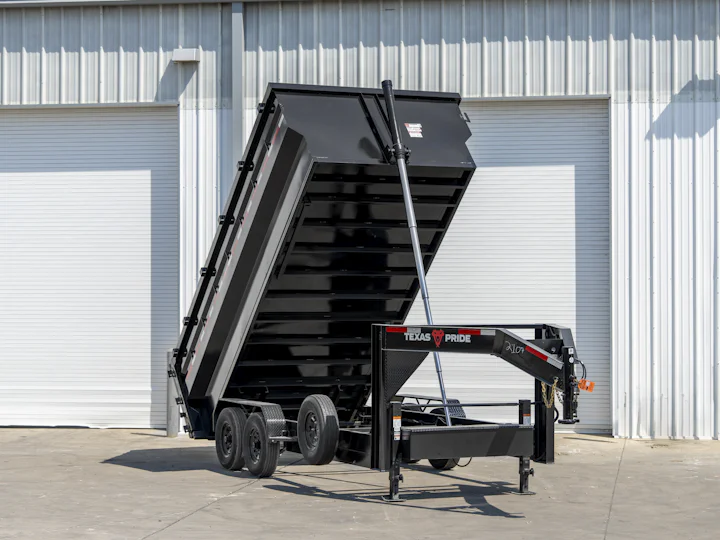 Texas Pride 16'x83" Gooseneck Dump Trailer w/ 48" Sides, bed raised view