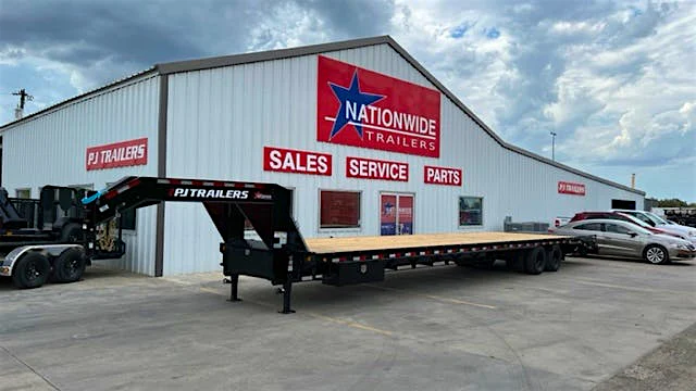 PJ Trailers 40'x102" Flatbed Trailer w/ Duals & Air-ride (FD) - Stock #FDQ40C2HLWK-GV25-JA02-RTST-SB02 - Image 1 of 7 PJ Trailers 40'x102" Flatbed Trailer w/ Duals & Air-ride (FD) - Stock #FDQ40C2HLWK-GV25-JA02-RTST-SB02 - Image 1 of 7
