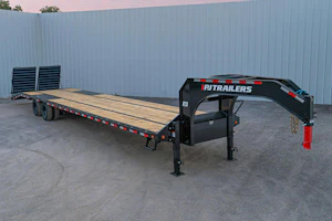 PJ Trailers 40 ft · 25.9K GVWR · 5 ft dovetail · Monster ramps · hydraulic disc brakes