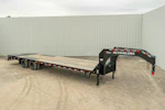 PJ Trailers 32 ft · 25K GVWR · 5 ft dovetail · Monster ramps Stock #90643 - Thumbnail 1