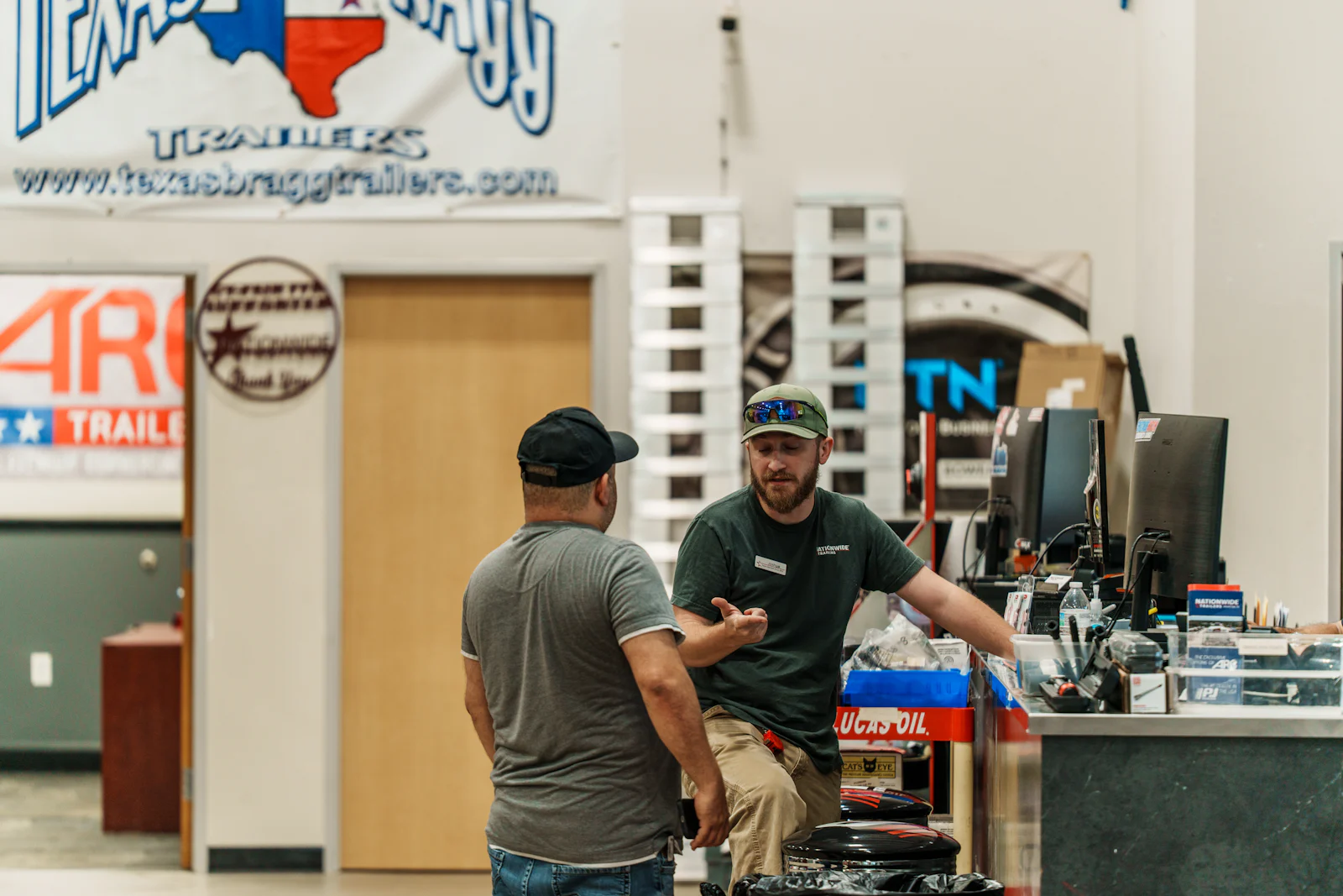 Advisor walking a customer through trailer options