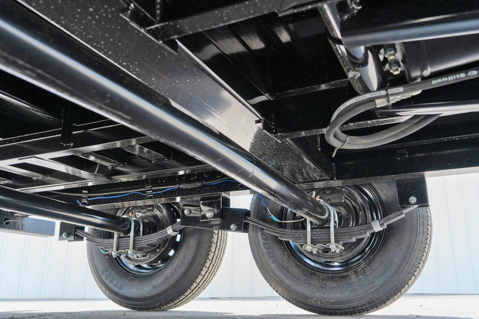 Trailer leaf-spring suspension and running gear