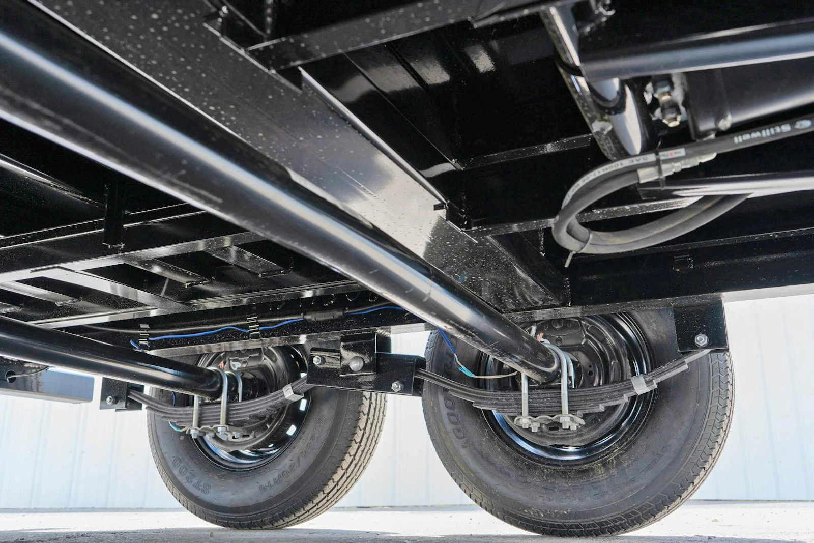 Trailer leaf-spring suspension and running gear