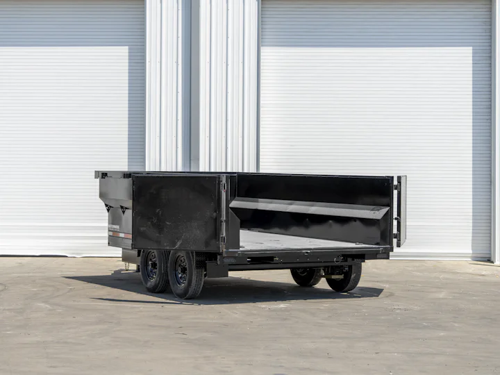Texas Pride 14'x83" Bumper Pull Dump Trailer w/ 36" Sides, rear three-quarter doors open view