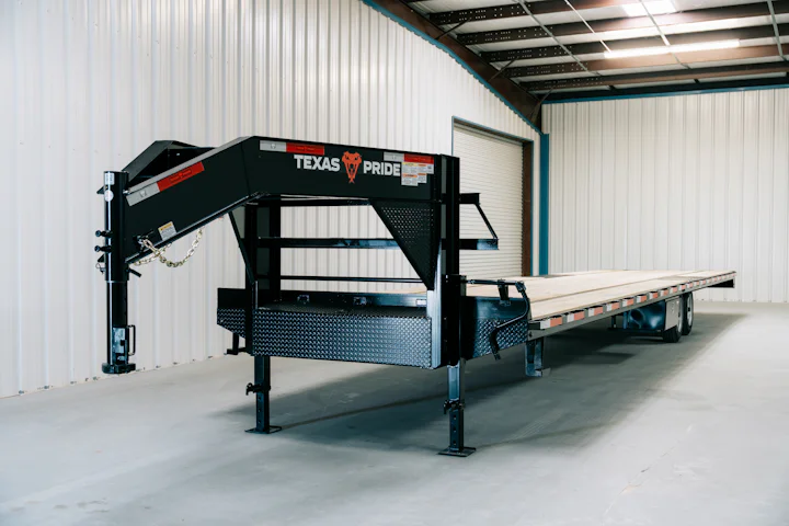 Texas Pride 40-foot straight-deck gooseneck flatbed, alternate front driver-side view