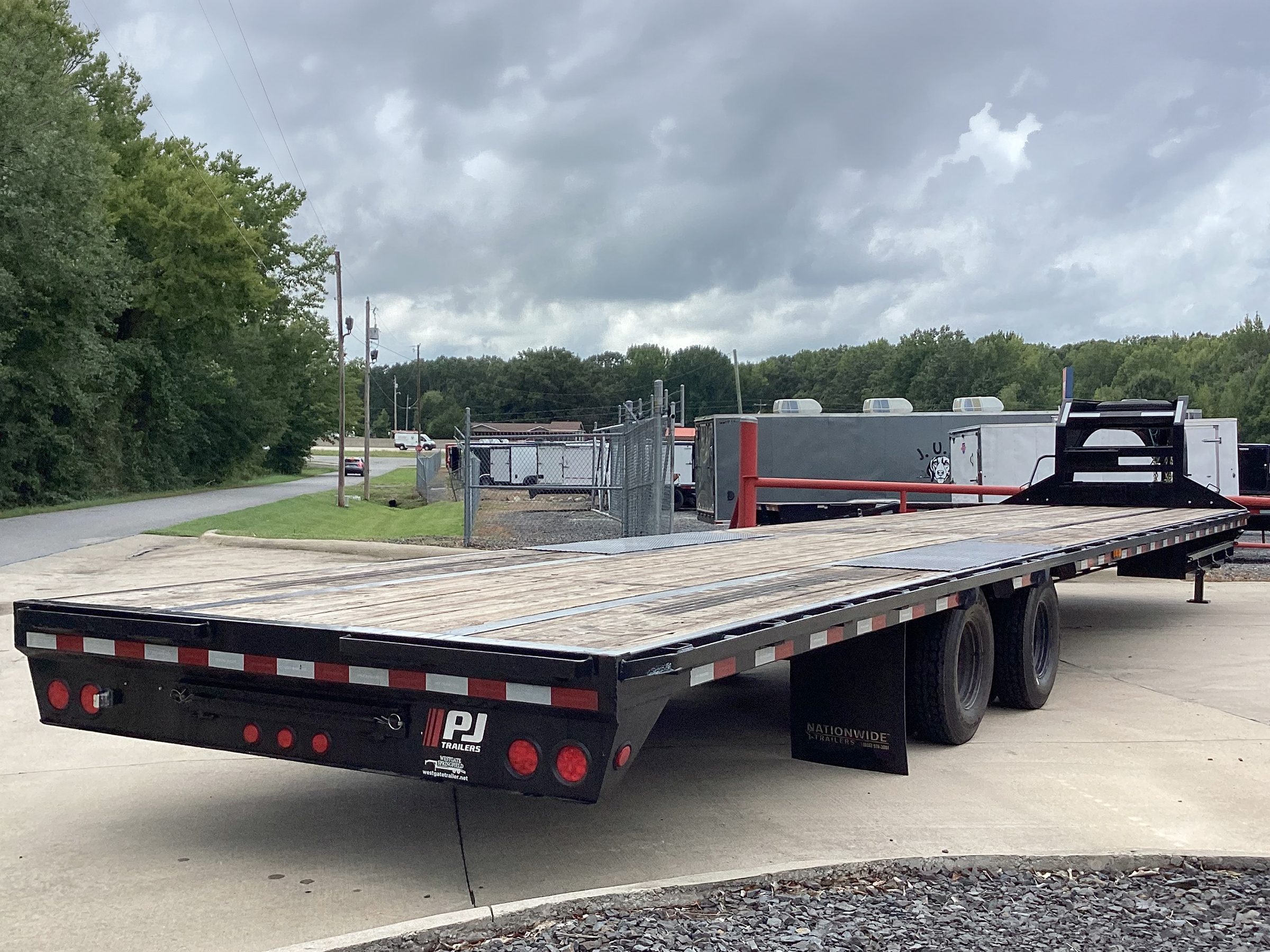 PJ Trailers 40'x102" Flatbed Trailer w/ Slide-In Ramps (LD)