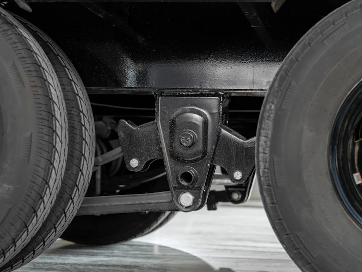 PJ Trailers Low-Pro Flatdeck With Duals, studio view 8