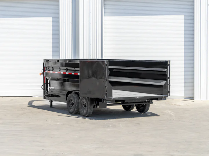 Texas Pride 16'x83" Gooseneck Dump Trailer w/ 48" Sides, rear three-quarter doors open view