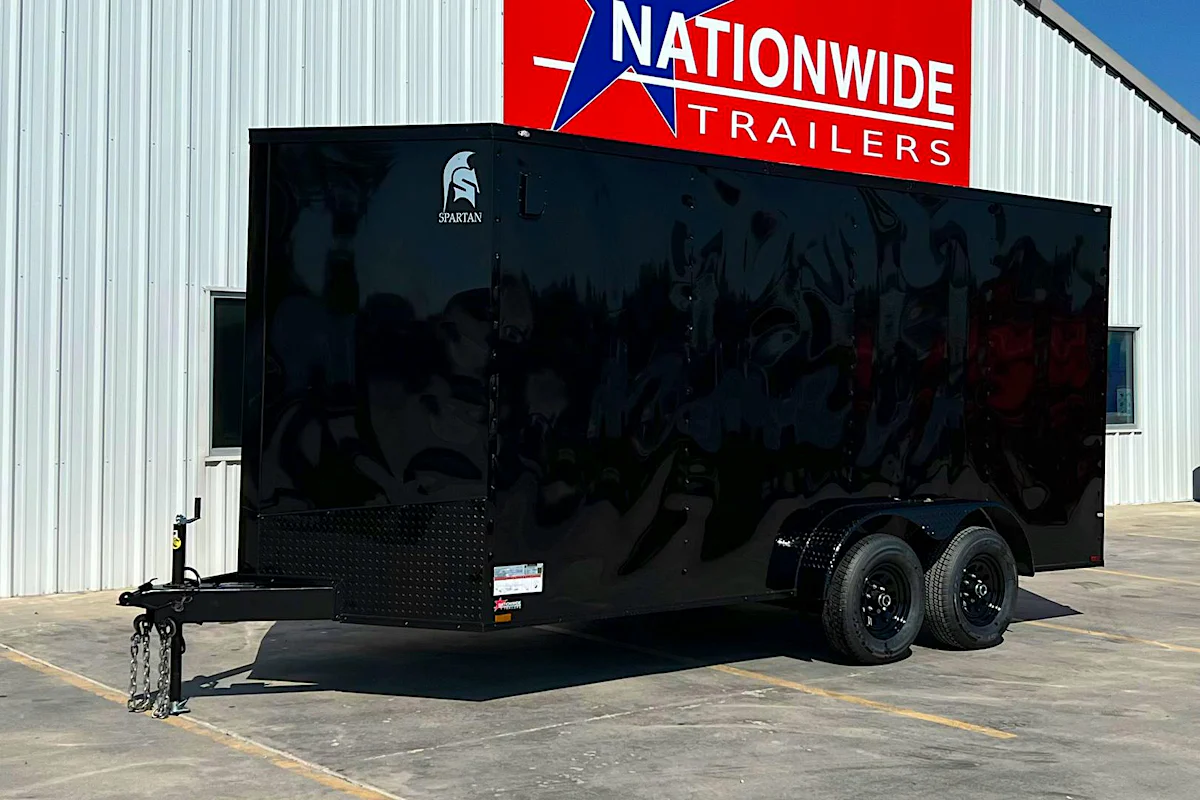 Spartan 7 x 16 ft · 7K GVWR · black blackout · 6 ft 6 in interior · plywood floor - Stock #89633 - Image 1 of 2 Spartan 7 x 16 ft · 7K GVWR · black blackout · 6 ft 6 in interior · plywood floor - Stock #89633 - Image 1 of 2