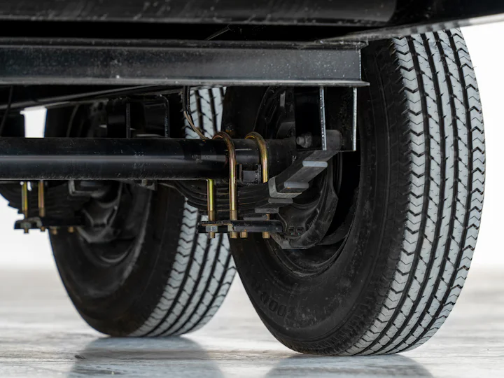 PJ Trailers Low-Pro Flatdeck With 7K Singles, studio view 19