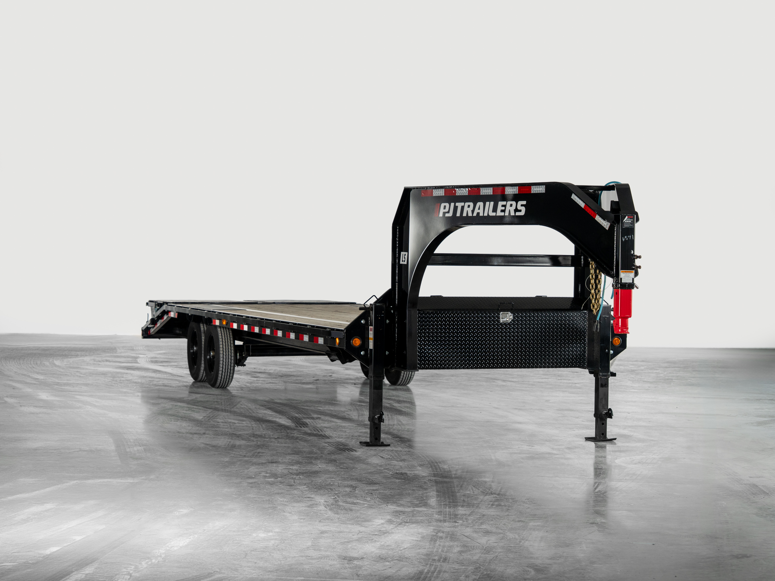 PJ Trailers Low-Pro Flatdeck With 7K Singles, studio view 1