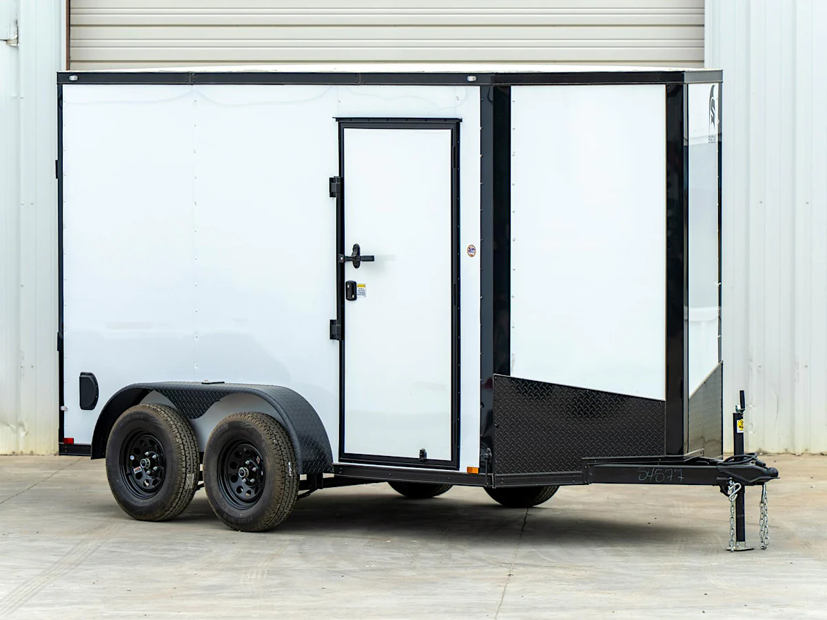 Spartan 6 x 12 ft · white blackout · 7 ft interior · plywood floor - Stock #89341 - Image 1 of 4 Spartan 6 x 12 ft · white blackout · 7 ft interior · plywood floor - Stock #89341 - Image 1 of 4