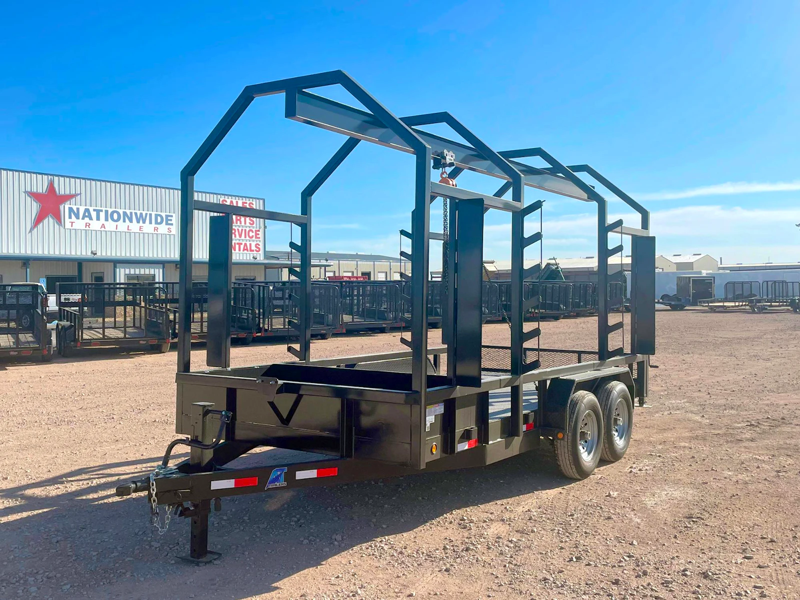 Black AT SM Monorail trailer, front three-quarter view
